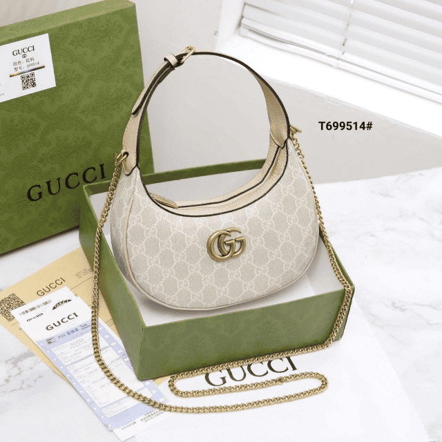 Tas Gucci GG PVC Half-Moon-Shaped Mini Bags T699514